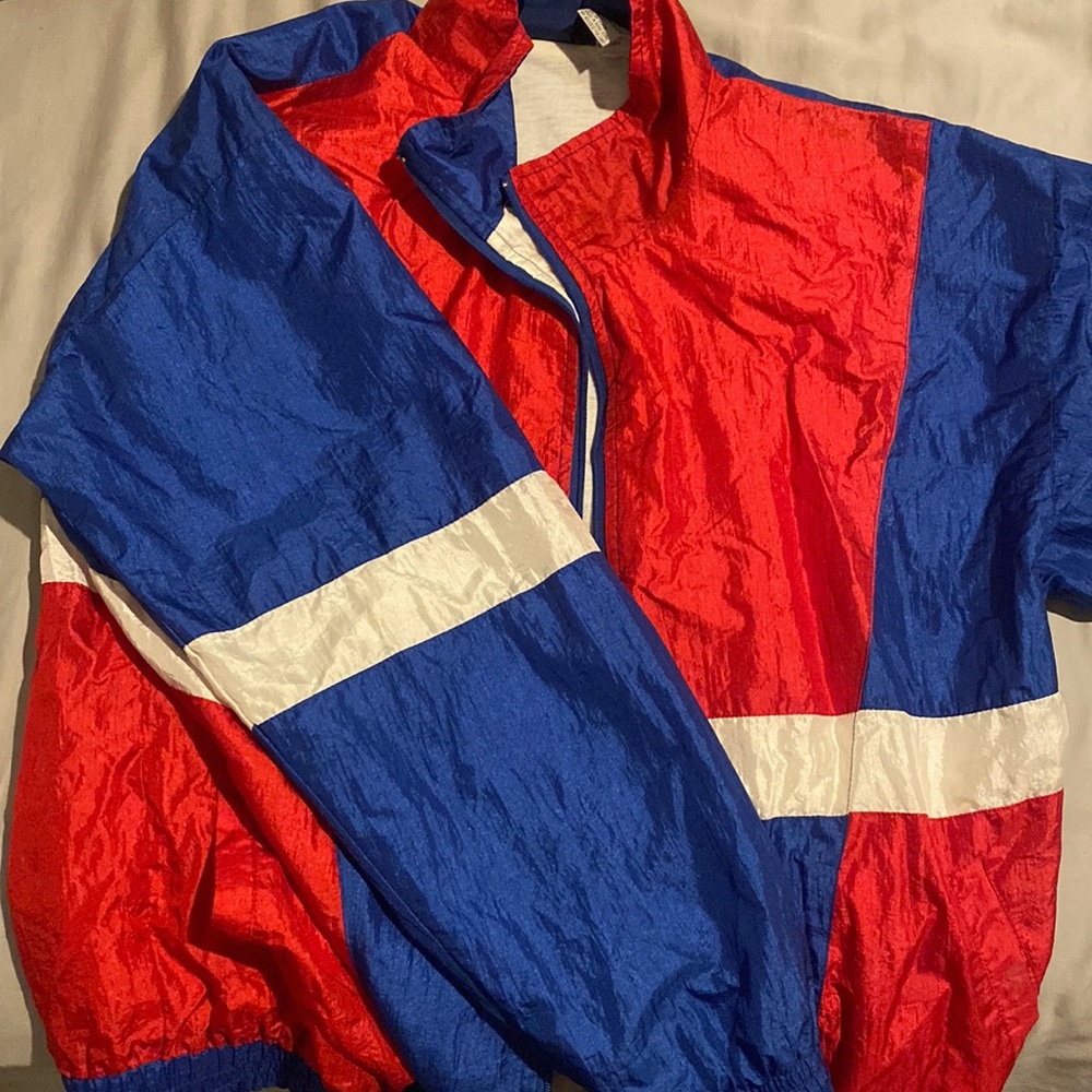 Oversized thrifted red, blue, and white windbreaker